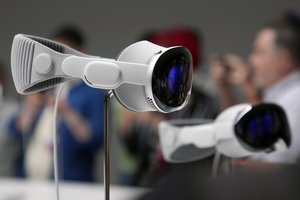 The Apple Vision Pro headset is displayed in a showroom on the Apple campus in Cupertino, Calif., at the company's annual developers conference, Monday, June 5, 2023.