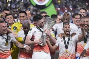 West Ham players celebrates with the trophy after winning the Europa Conference League final soccer