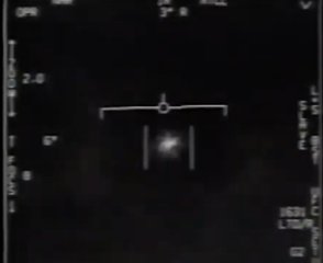 File - A still from one of the videos, filmed by US Navy aircraft, released by the Pentagon showing a UFO.