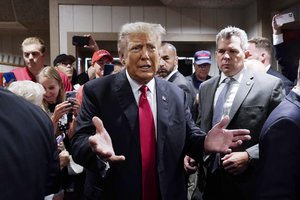 FILE - Former President Donald Trump greets supporters before speaking at the Westside Conservative Breakfast, June 1, 2023, in Des Moines, Iowa.