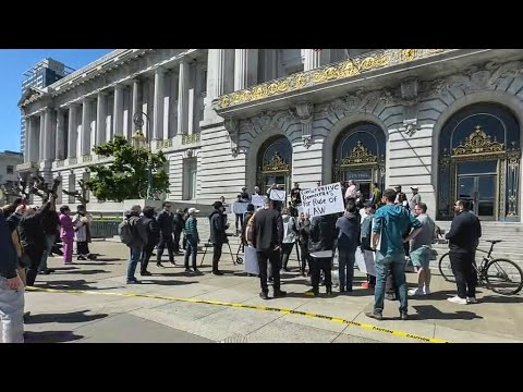 Demonstrators at San Francisco City Hall demand action on street crime