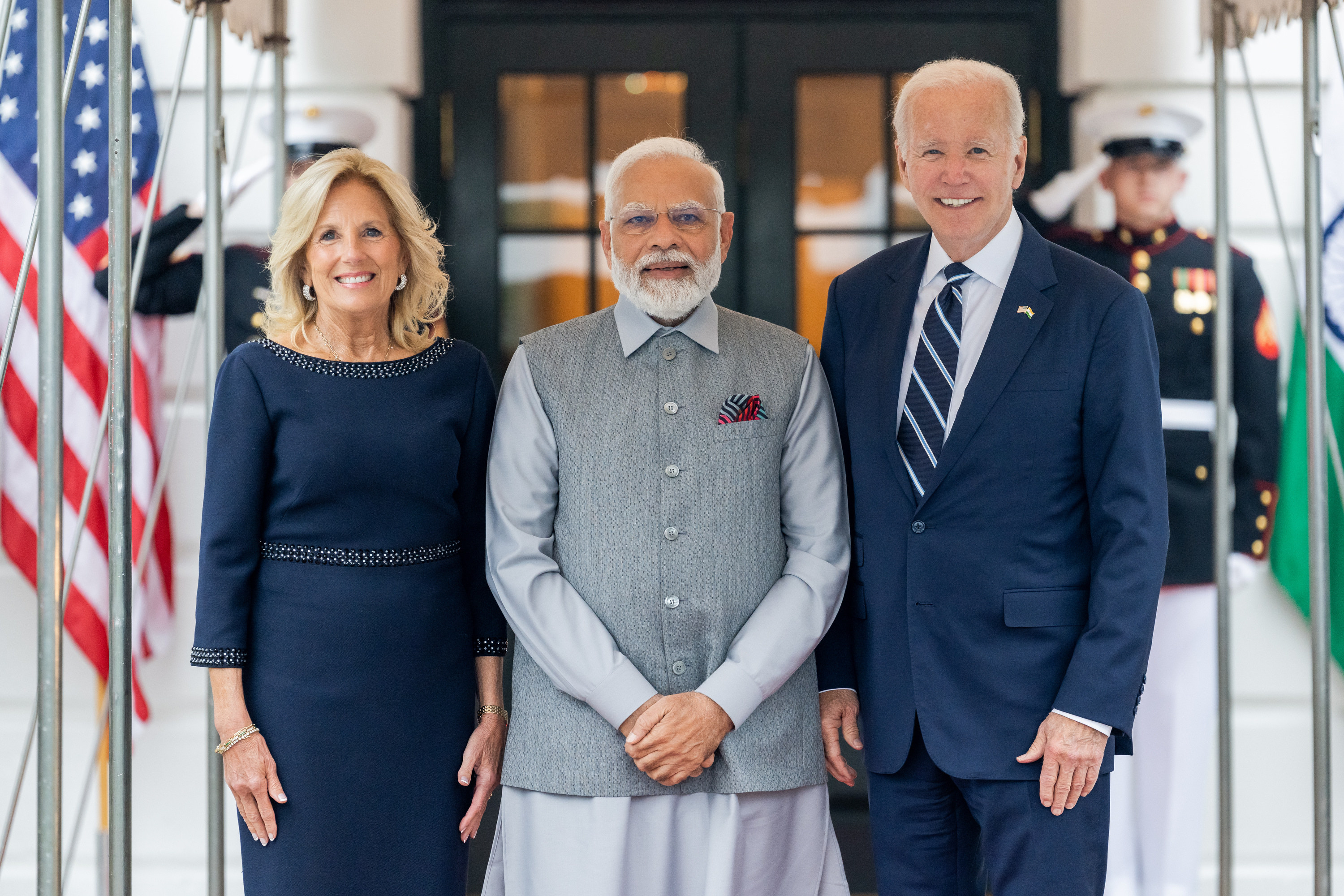 The First Lady, Prime Minister Modi, and President Biden are pictured outside the White House.