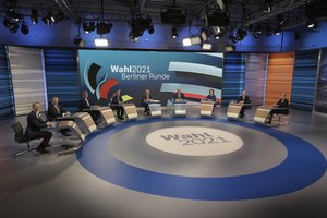 From left: the AfD's top candidate Alice Weidel, FDP's top candidate Christian Lindner, CSU leader Markus Soeder, Armin Laschet of the CDU, the CDU/CSU's candidate for chancellor, moderators Rainald Becker and Peter Frey, Annalena Baerbock, candidate for chancellor of the Green Party, Olaf Scholz, candidate for chancellor of the SPD, as well as the chairwoman of the party Die Linke, Susanne Hennig-Wellsow, talk about the Bundestag election in an election studio of ZDF at the "Berliner Runde" Sunday Sept. 2021 in Berlin