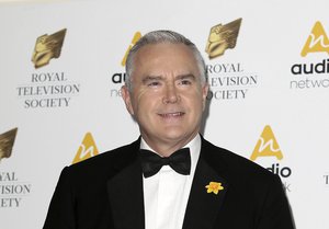 BBC Journalist Huw Edwards poses for photographers upon arrival