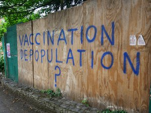 File - Hand-written graffiti expressing opposition to the vaccination of children amid the COVID-19 pandemic. Photographed in Boscombe, Dorset, England.