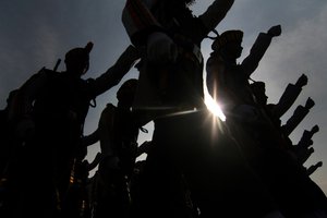 Indian police   march during a rehearsal for the Republic Day celebration in srinagar the summer capital of Indian Kashmir on 24/1/2010. Thousands of police and paramilitary soldiers with automatic weapons searched vehicles in Indian Kashmir as part of beefed up security aimed at preventing attacks by Islamic separatists ahead of India's Republic Day celebrations, Menwhile Thousands of people shouting