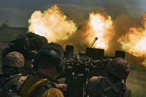 Ukrainian soldiers fire a cannon near Bakhmut, an eastern city where fierce battles against Russian forces have been taking place, in the Donetsk region, Ukraine, May 15, 2023