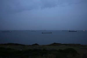 Cargo ships anchor at the Black Sea wait to cross the Bosporus strait in Istanbul, Turkey, on Nov. 17, 2022