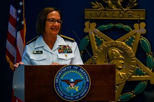 Adm. Lisa Franchetti delivers remarks during the change of office ceremony at the Pentagon