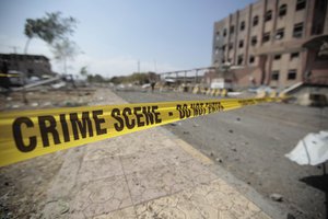 File - Police tape closes the site of a Saudi-led coalition airstrike in Sanaa, Yemen, Sunday, Feb. 4, 2018. Yemeni rebels say an air raid by the coalition fighting them struck a police building in the rebel-controlled capital, Sanaa, killing at least eight people.