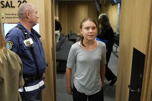 Climate activist Greta Thunberg of Sweden leaves a court room after a hearing in Malmo, Sweden, Monday, July 24, 2023