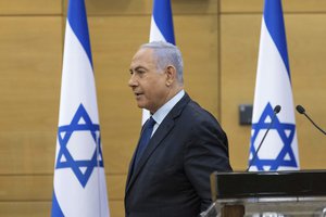 Israeli Prime Minister Benjamin Netanyahu speaks to the Israeli Parliament in Jerusalem, Sunday, May 30, 2021.