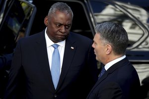 U.S. Secretary of State Antony Blinken, right, and U.S. Secretary of Defense Lloyd Austin arrive at Queensland Government House in Brisbane, Australia, Saturday, July 29, 2023.