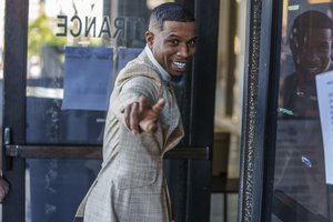 Singer Tory Lanez enters the Clara Shortridge Foltz Criminal Justice Center for his trial Tuesday, Dec. 13, 2022, in Los Angeles