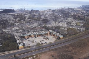 Wildfire wreckage is left behind following a stubborn blaze on Thursday, Aug. 10, 2023, in Lahaina, Hawaii