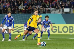 Sweden's Filippa Angeldal scores her side's second goal from the penalty spot during the Women's World Cup quarterfinal soccer match between Japan and Sweden at Eden Park in Auckland, New Zealand, Friday, Aug. 11, 2023