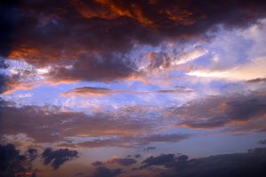 Stunning beautiful sky at dusk or dawn with sunlit clouds in Jammu, India, 11 July 2020.