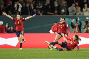 Spain's Olga Carmona, right, celebrates after she scored her side's second goal during the Women's World Cup semifinal soccer match between Sweden and Spain at Eden Park in Auckland, New Zealand, Tuesday, Aug. 15, 2023