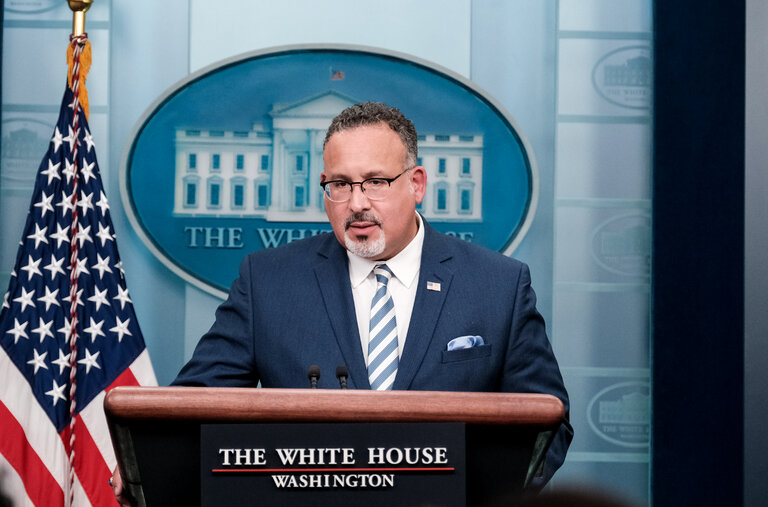 U.S. Education Secretary Miguel Cardona spoke at a press briefing last month.