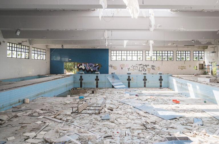 An abandoned swimming pool that the police say was one place where two young girls were raped by a gang of their peers, all residents of the town of Caivano, on the outskirts of Naples.