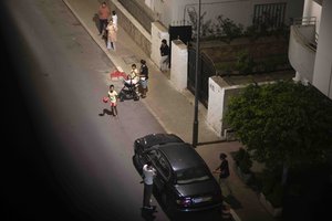 People take shelter outside their homes after an earthquake in Rabat, Morocco, Friday, Sept. 8, 2023. A powerful earthquake struck Morocco late Friday, damaging buildings in major cities and sending panicked people pouring into streets and alleyways from Rabat to Marrakech.