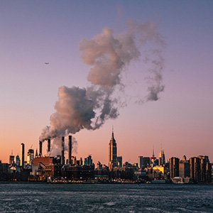 Panoramic photograph of smokes billowing from New York City buildings. MATTEO CATANESE/UNSPLASH