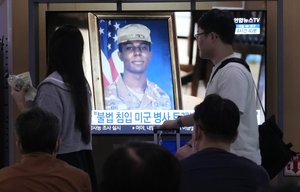 A TV screen shows a file image of American soldier Travis King during a news program at the Seoul Railway Station in Seoul, South Korea, Wednesday, Sept. 27, 2023. North Korea said Wednesday that it will expel King who crossed into the country through the heavily armed border between the Koreas in July.