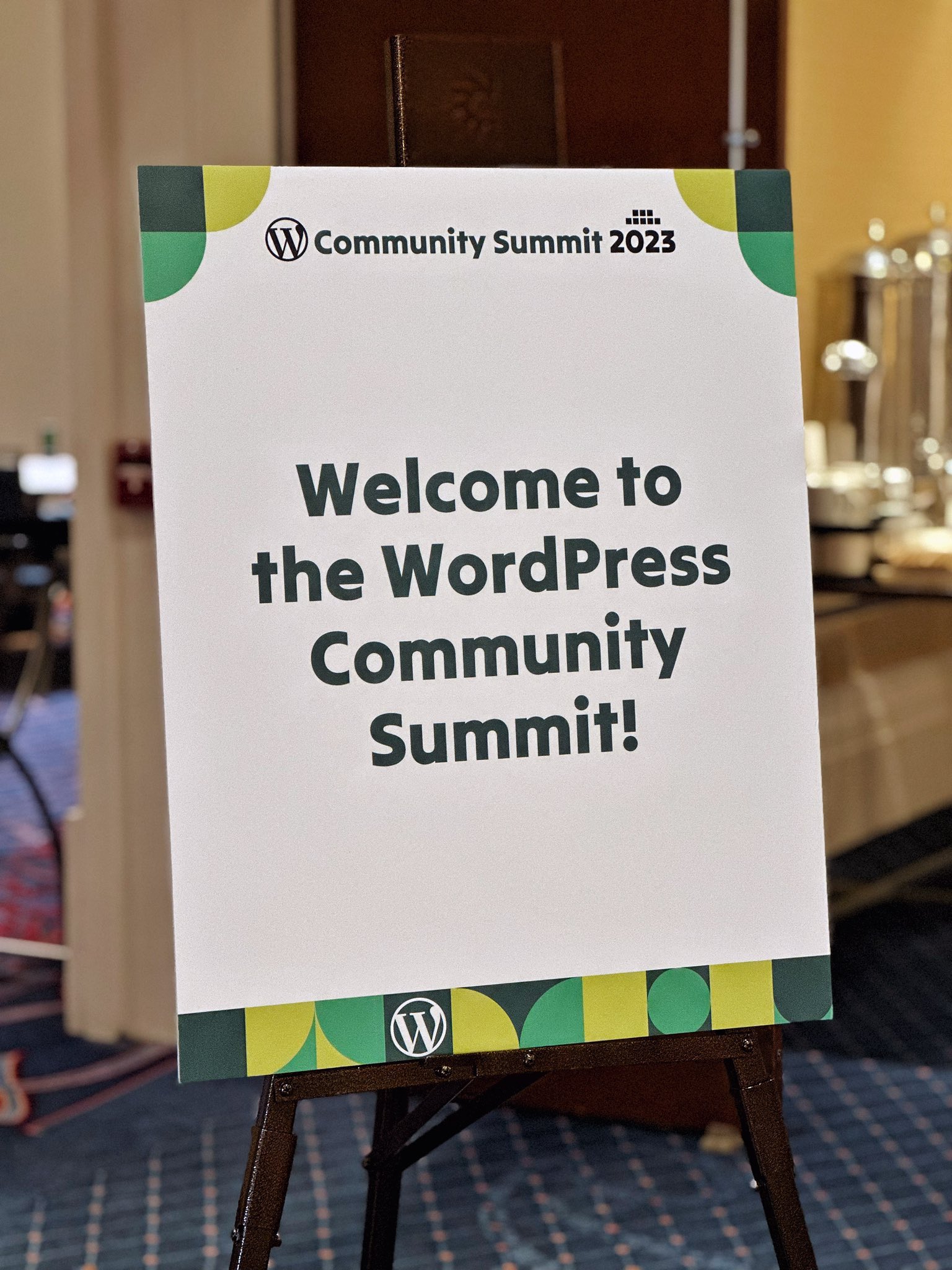 A sign that says “welcome to the WordPress Community Summit!”