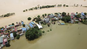 Floodwaters surround a village in Chuong My district, Hanoi, Vietnam on July 31, 2018