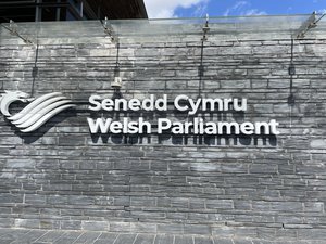 Senedd Cymru - Welsh Parliament signage outside the Senedd building