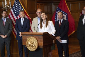 Arkansas Gov. Sarah Huckabee Sanders speaks at a newss conference to announce the opening of a new $33 million missile production facility