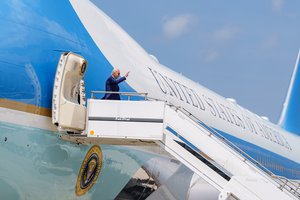 Joe Biden disembarks Air Force One at Brunswick Executive Airport in Brunswick, Maine