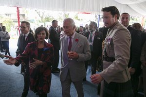 Britain's King Charles III, centre. greets attendees during a reception at the British High Commissioner's Residence, in Nairobi, Kenya, Wednesday, Nov. 1, 2023