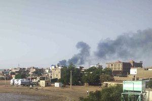 Smoke rises over Khartoum, Sudan, Friday, June 23, 2023