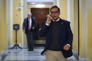 Rep. George Santos, R-N.Y., departs Capitol Hill in Washington, Wednesday, Jan. 11, 2023