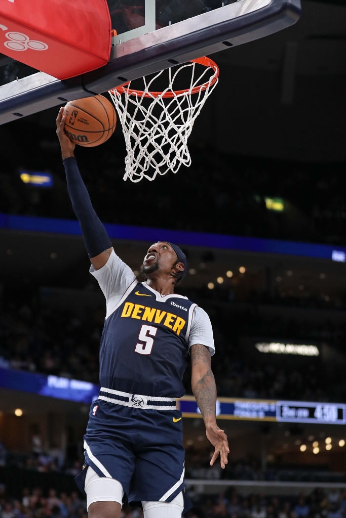 Slideshow-image: MEMPHIS, TENNESSEE - OCTOBER 27: Kentavious Caldwell-Pope #5 of the Denver Nuggets goes to the basket during the game against the Memphis Grizzlies...