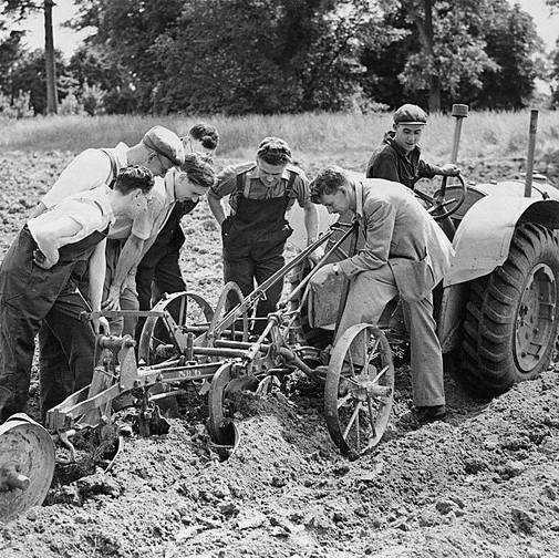 Conscientious objectors attending a course in mechanised agriculture at an agricultural school in Essex, UK, under the Ministry of Agriculture's labour training scheme