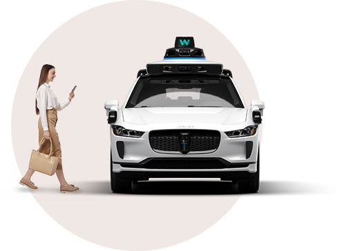 Woman approaching fully autonomous vehicle with shopping bag.