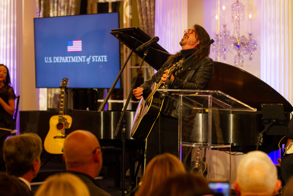 Musician Dave Grohl performs onstage during the launch of the Global Music Diplomacy Initiative at the Department of State on September 27, 2023, in Washington, D.C.