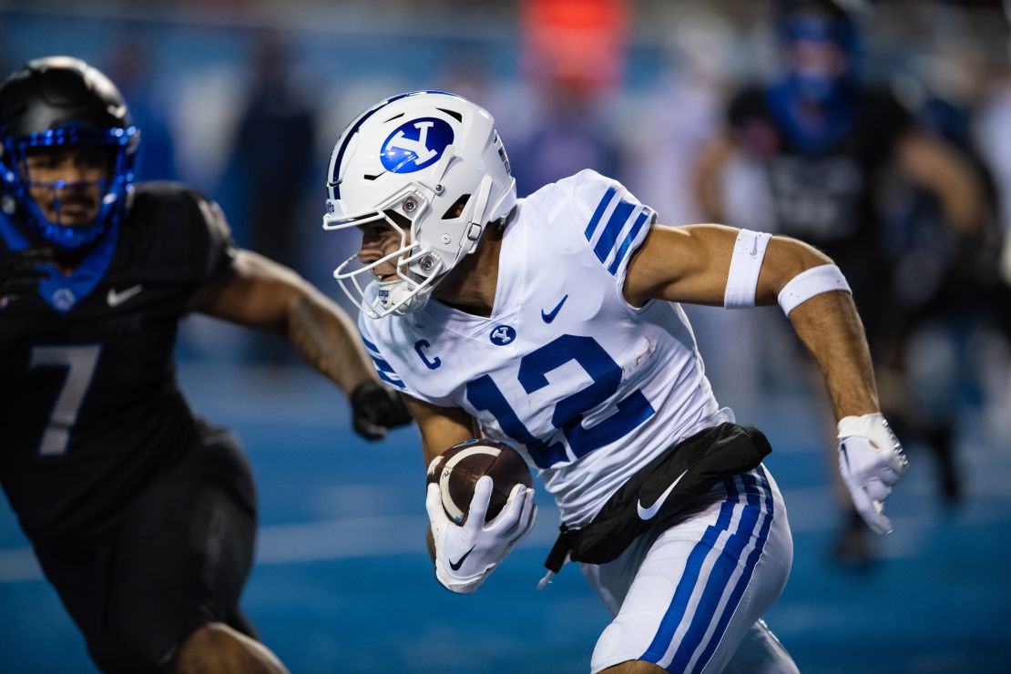 Brigham Young Cougars wide receiver Puka Nacua (12) rushes with the football during a college football game between the Brigham Young Cougars and the Boise State Broncos on November 5, 2022, at Albertsons Stadium in Boise, ID.