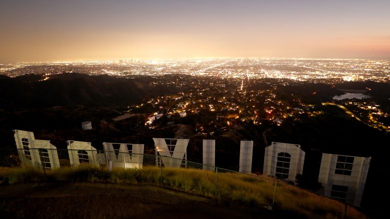 The Hollywood sign stands at dusk on day 106 of the SAG-AFTRA strike against the Hollywood studios on October 27, 2023 in Los Angeles, California.