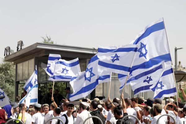 MR Online | ISRAELI SETTLERS WAVE ISRAELI FLAGS NEAR DAMASCUS GATE DURING THE FLAG MARCH IN JERUSALEM ON MAY 29 2022 PHOTO JERIES BSSIERAPA IMAGES | MR Online