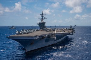 The aircraft carrier USS Carl Vinson (CVN 70) participates in a group sail during the Rim of the Pacific (RIMPAC) exercise off the coast of Hawaii, July 26, 2018