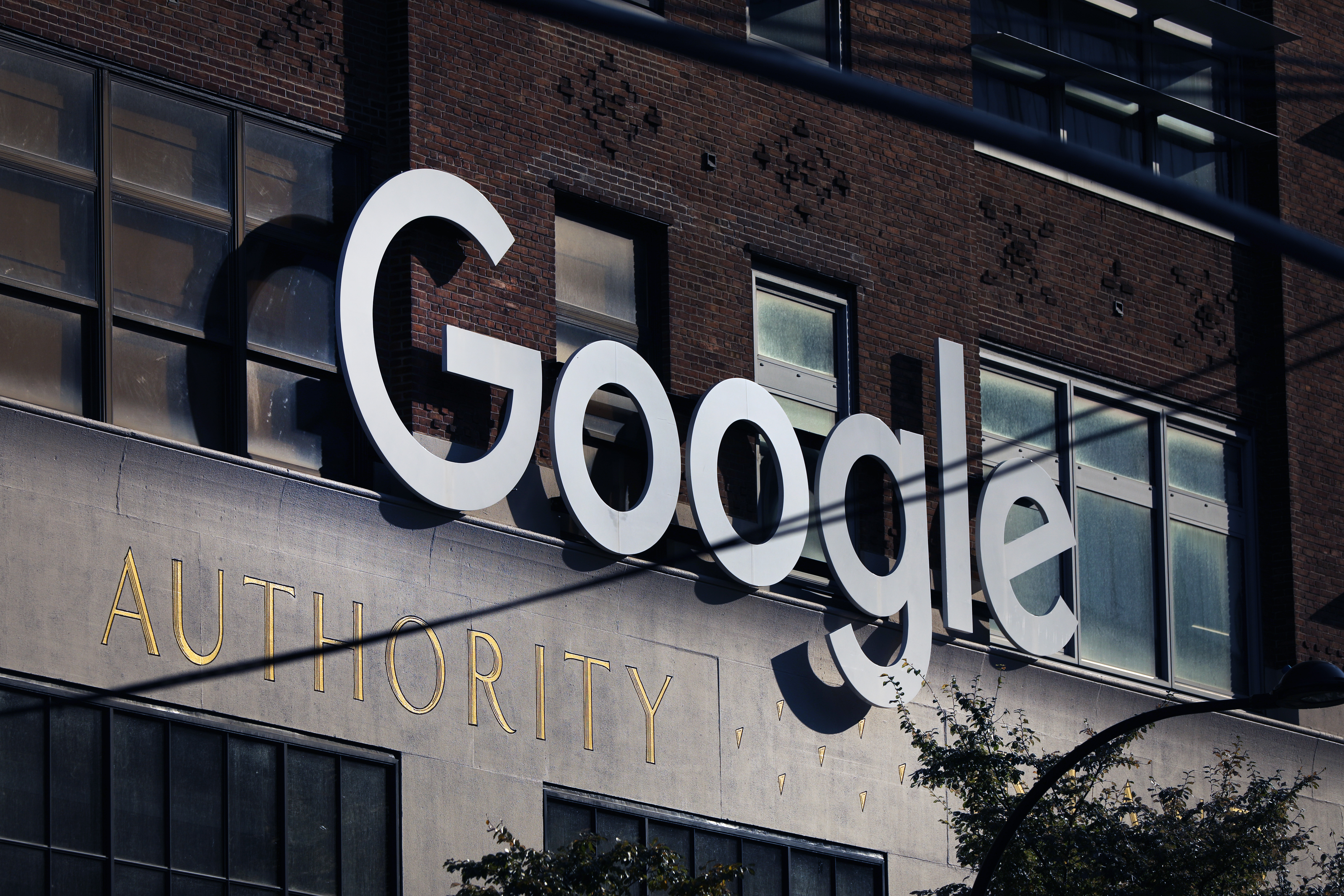 A Google sign on the outside of an office buiding.