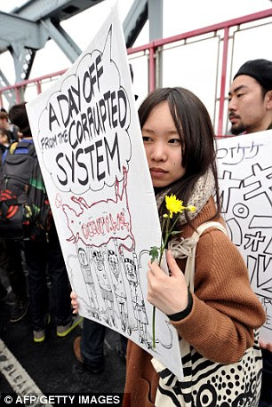 Occupy Wall Street protesters cross the Williamsburg Bridge during a march to Manhattan