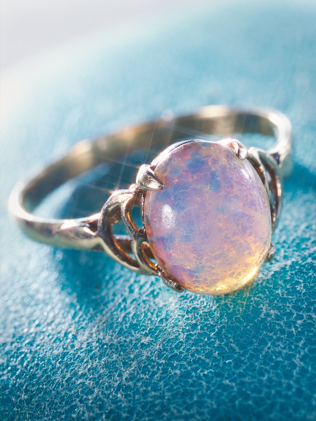 An image of a ring with a large iridescent stone. Photograph by Kyoko Hamada for The New Yorker.