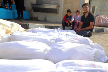 People mourn next to the dead bodies of the Abu Shehata family in Dair El-Balah, Gaza Strip, on November 8, 2023. (Photo: Omar Ashtawy/APA Images)