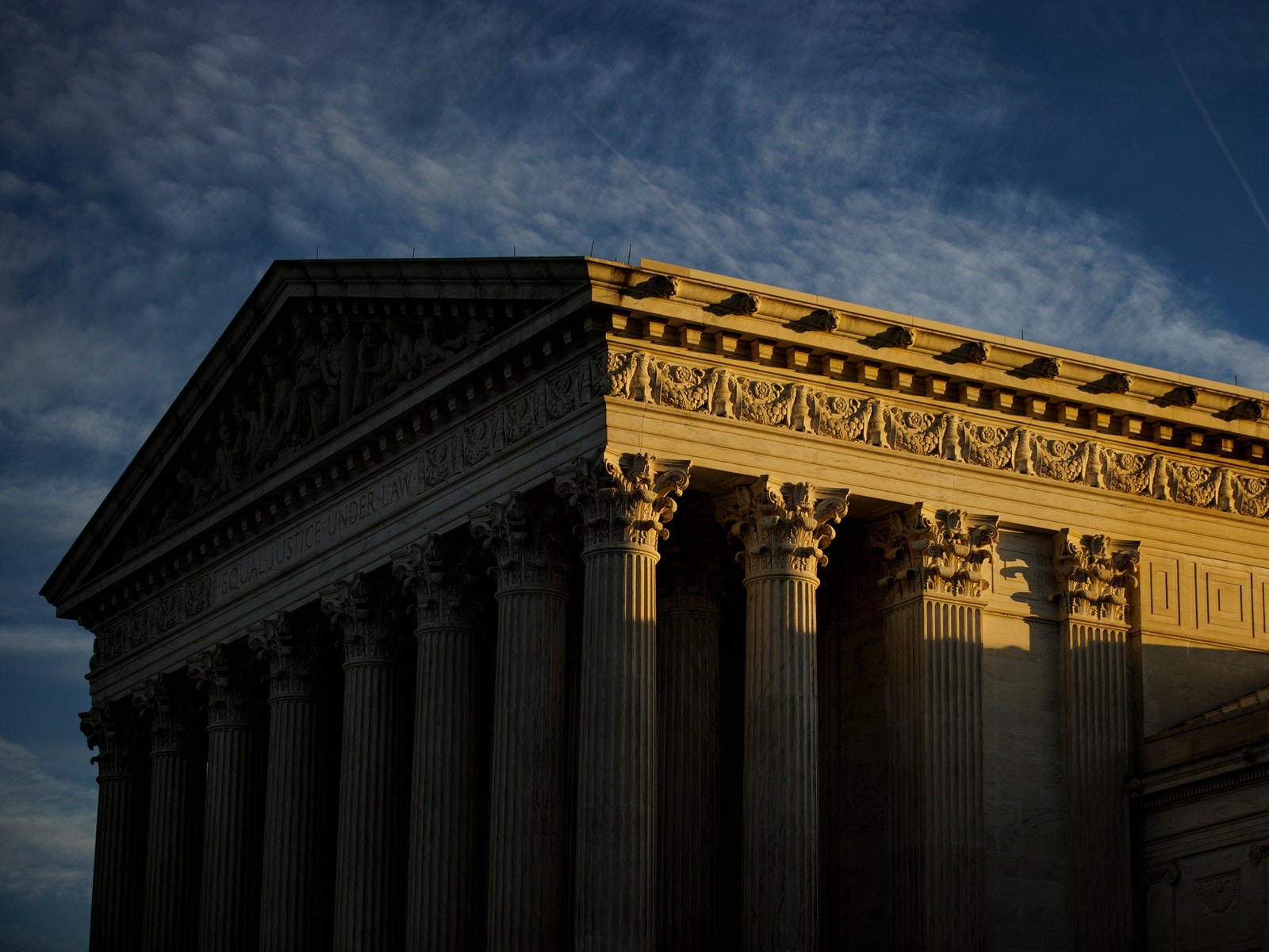 The rising sun creeps across the US Supreme Court.