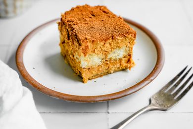 Slice of Pumpkin Tiramisu on a Plate Next to a Fork