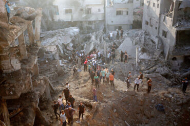 Palestinians conduct a search and rescue operation after the attack of the Israeli army at Maghazi refugee camp in Gaza City on November 3, 2023. (Photo by Omar Ashtawy/APA Images)